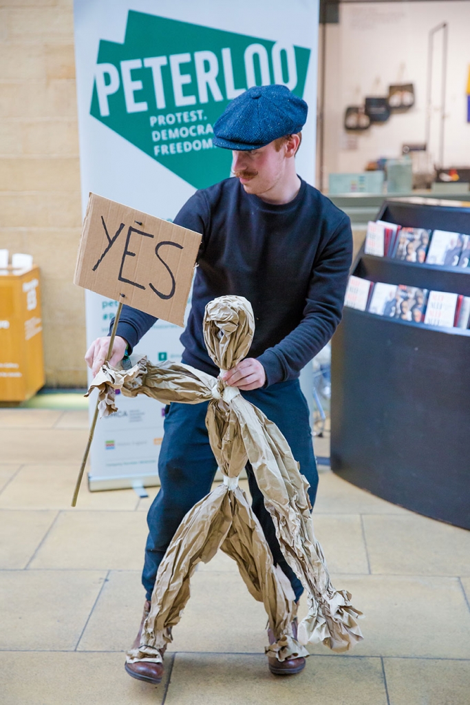 Thomas working with a Puppet