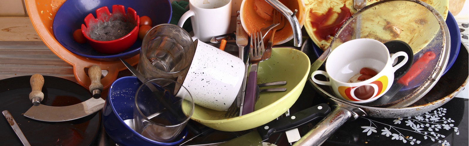 Image of dirty dishes in the sink