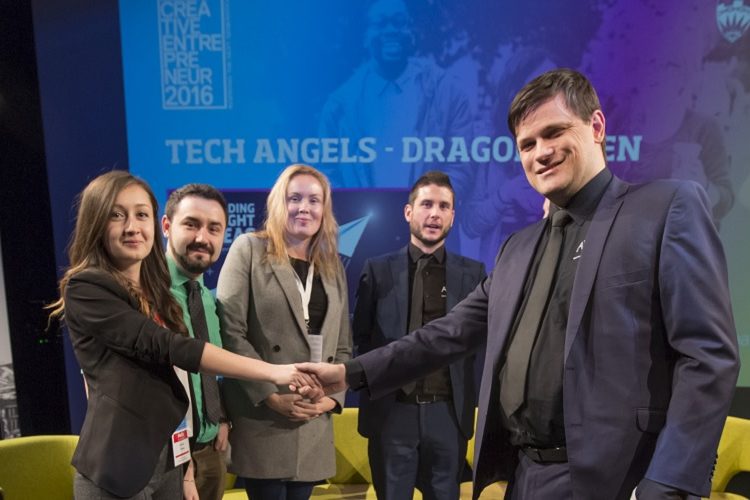 Lavinia shaking hands with the Tech Angels judging panel