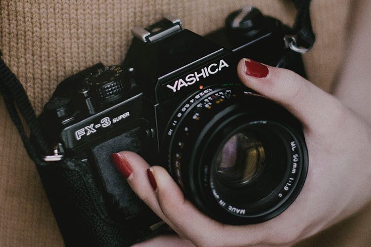 Image: Film camera in womans hand