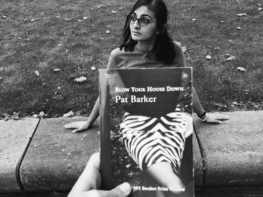 Image: Salma playing along with #BookFaceFriday