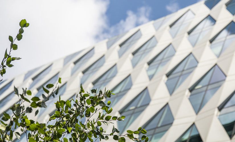 A shot of a building in MediaCityUK, the sky is clear and blue.