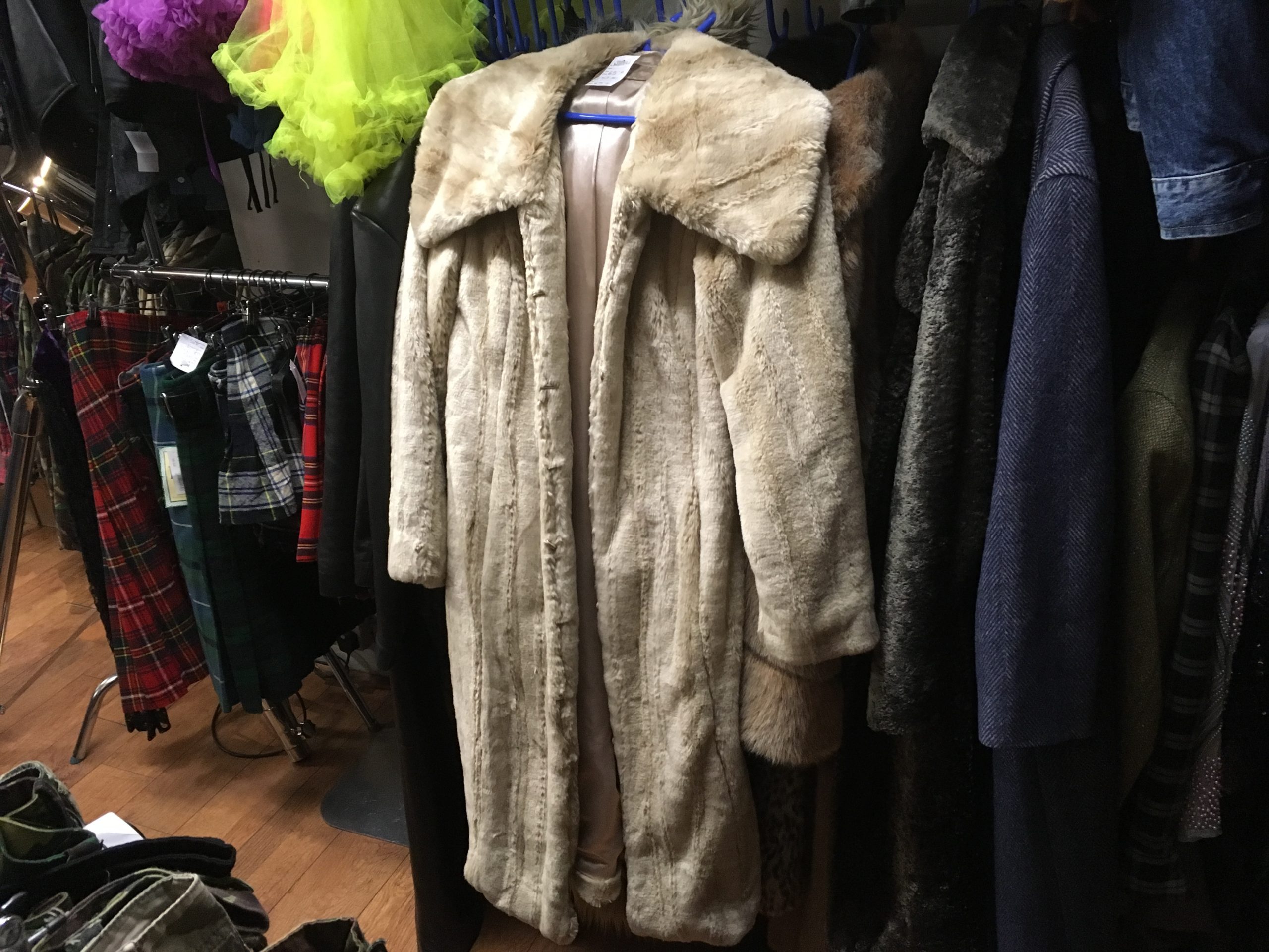 Faux fur coat on a hanger