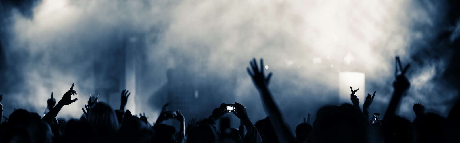 Photo of people raising their hands