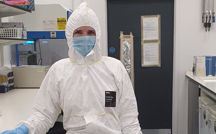 Photo of Holly Broadhurst fully covered with protective suits, masks and gloves