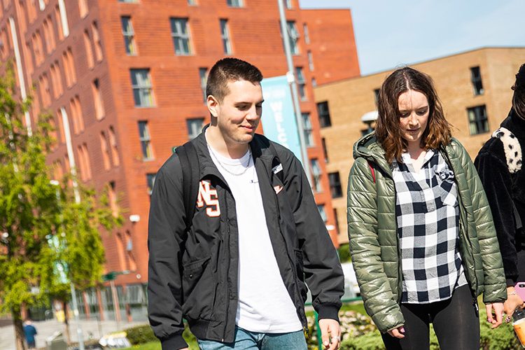 Students walking on Peel Park campus