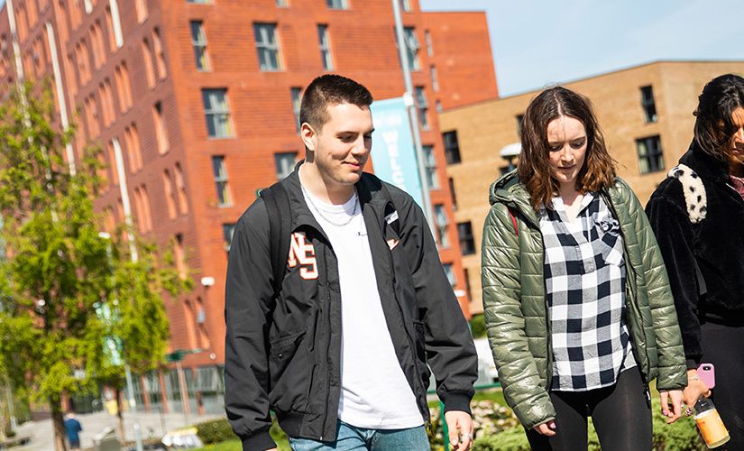 Students walking on Peel Park campus