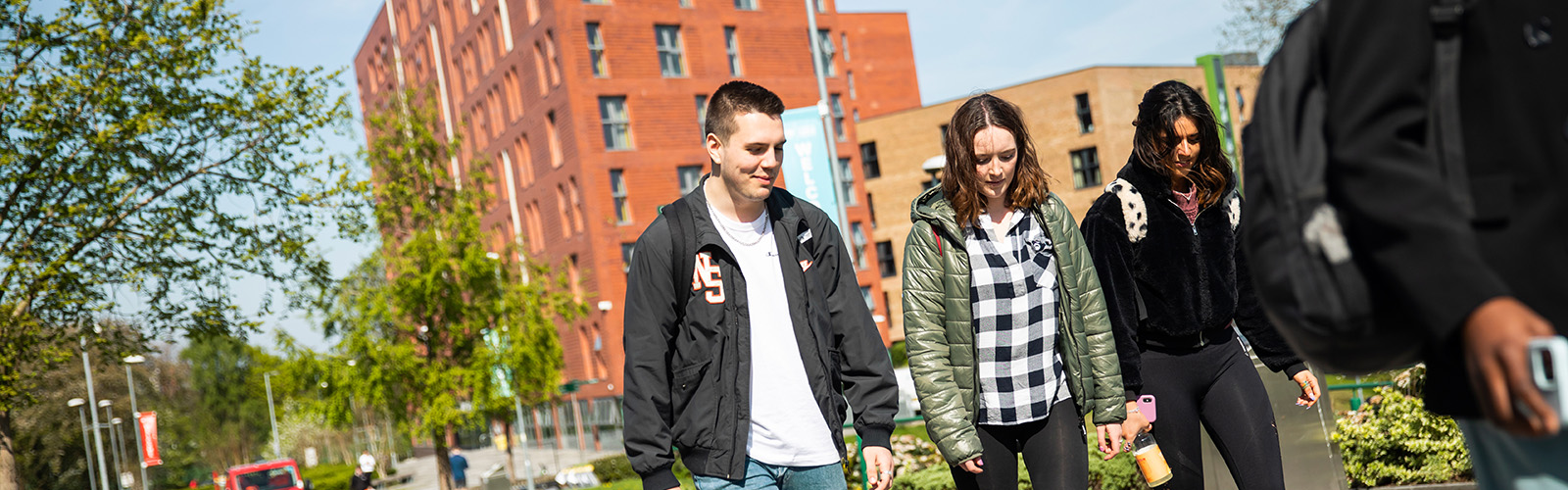 Students walking on Peel Park campus