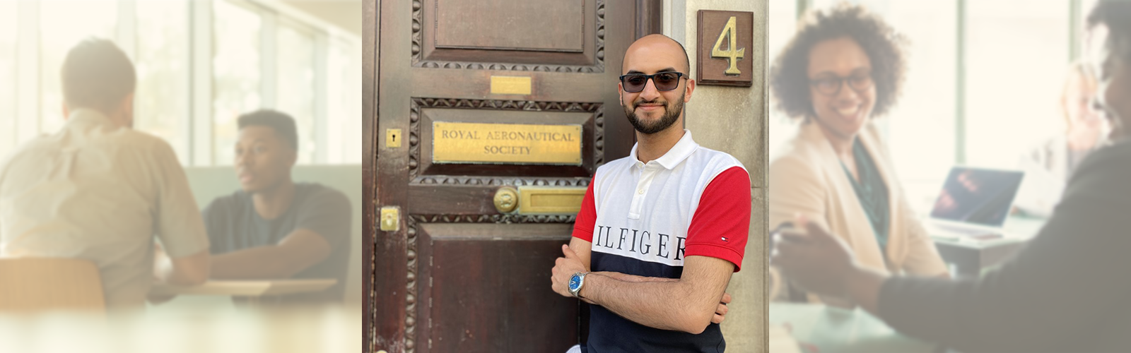 photo of Abdul standing next to the Royal Aeronautical Society door