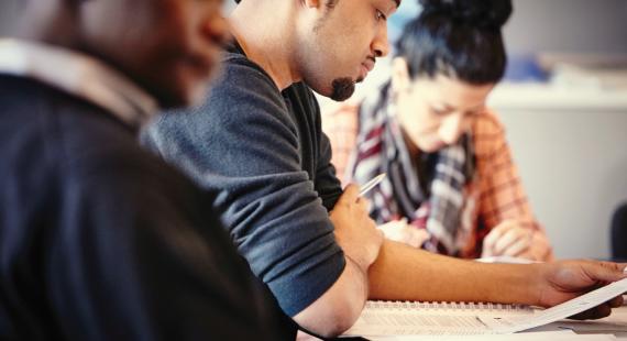 Student looking at their study notes