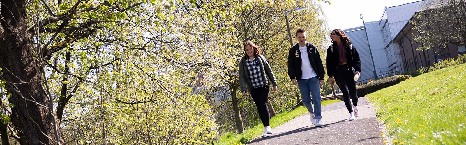 Students walking on Peel Park campus