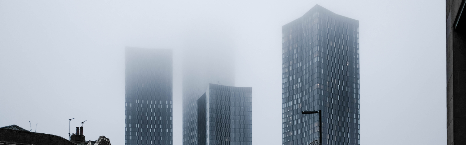 Photo of the Skyscapers in Deansgate with mist