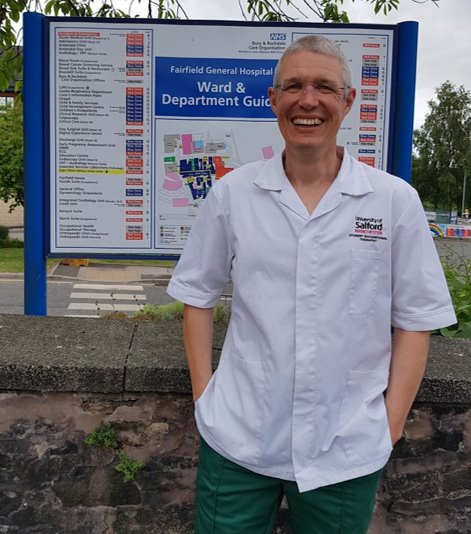 Photo of Peter wearing Uni of Salford Shirt