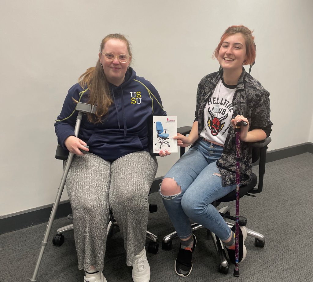 Emma and another student still on ergonomic chairs