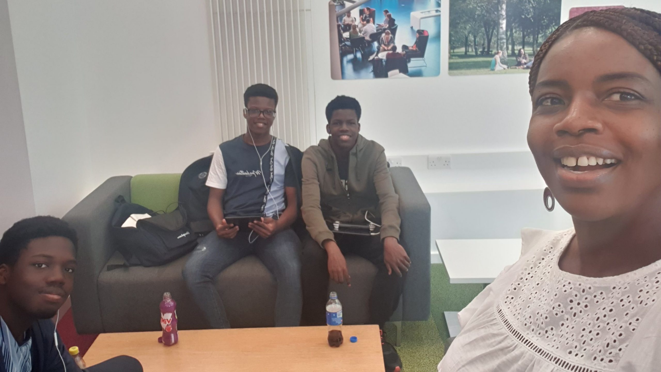 Selfie of Olubukola and her kids in one of the buildings on campus.