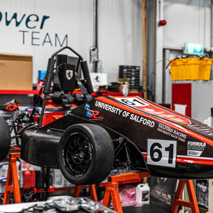 Formula Student Car with university of salford logo on it