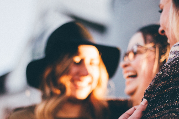 A group of friends laughing together.