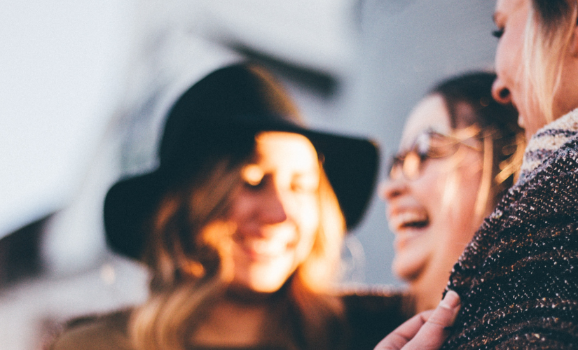 A group of friends laughing together.