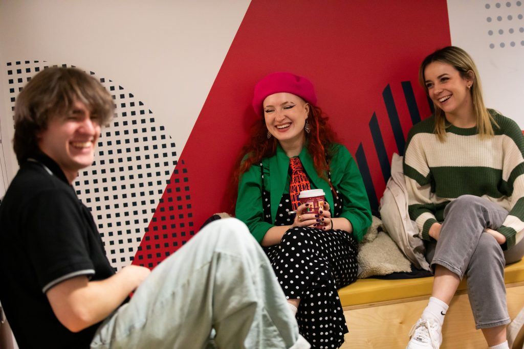 Three students hanging out in Lady Hale.