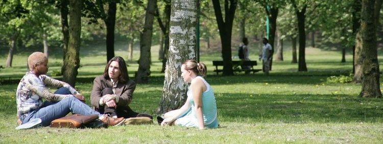 Students sat in Peel Park