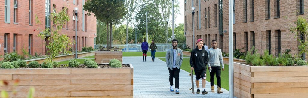 Students leaving Peel Park Quarter accommodation