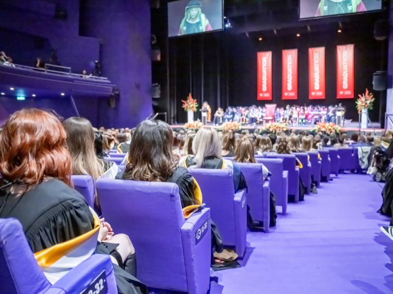 Graduates sat in their Graduation ceremony.