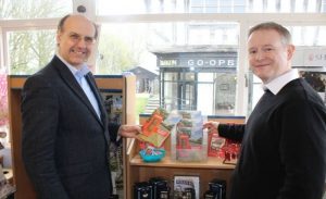 Profs Nigel Linge and Andy Sutton with their publication in gift shop